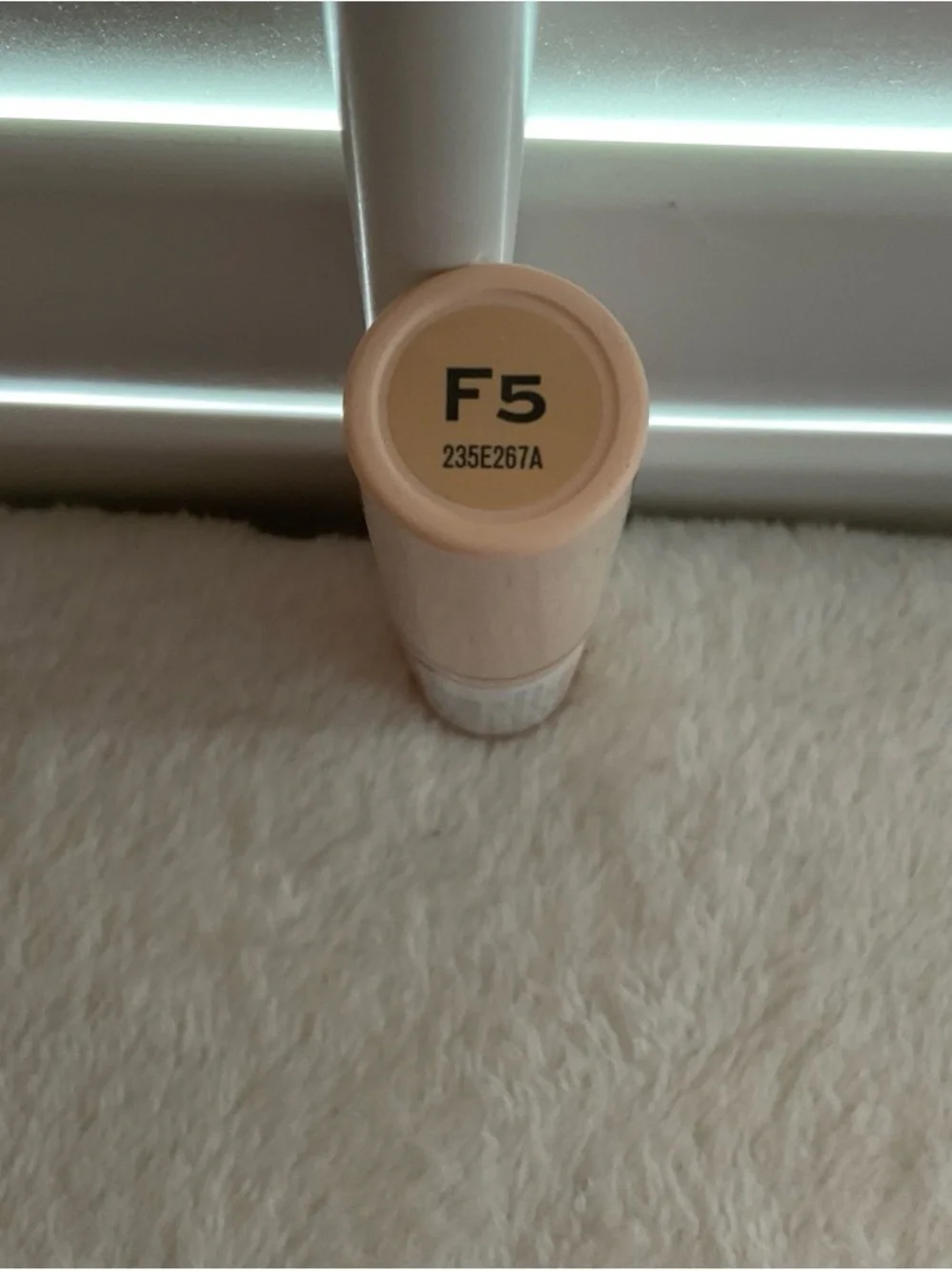 Revolution Pale Pink Foundation Stick with Rose Gold Band